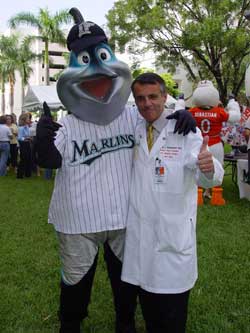Billy the Marlin with Pascal J. Goldschmidt, dean of the Miller School of Medicine