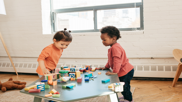 two toddlers playing